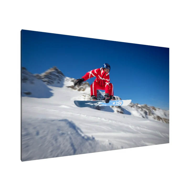 Tablou Canvas: Salt în aer al unui snowboarder