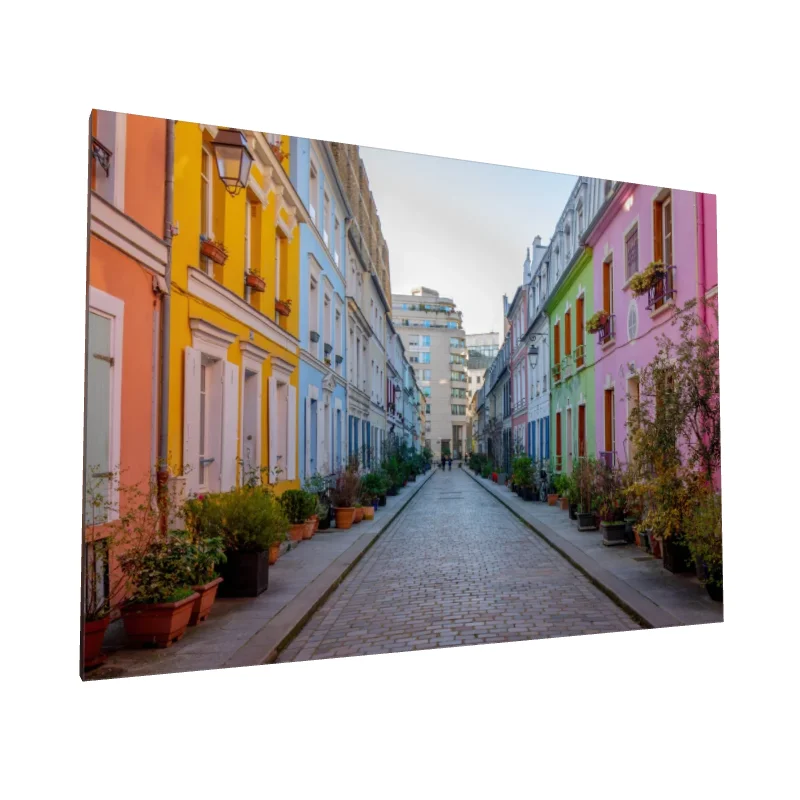 Tablou canvas: Stradă Pavată cu Clădiri Colorate - Image 1