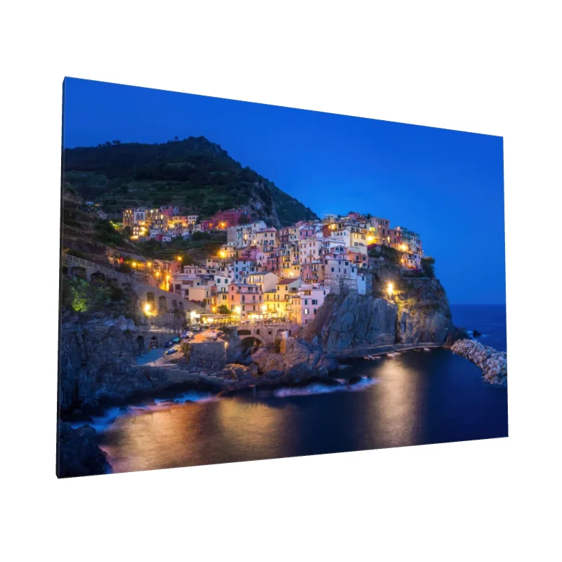 Tablou canvas: Oraș Pitoresc Luminat Noaptea la Mare